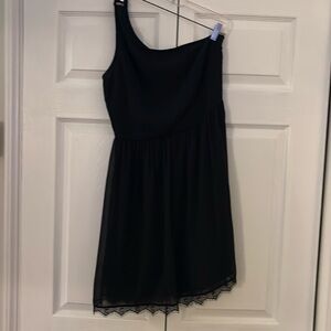 Black cocktail dress, one side strap, chiffon material.